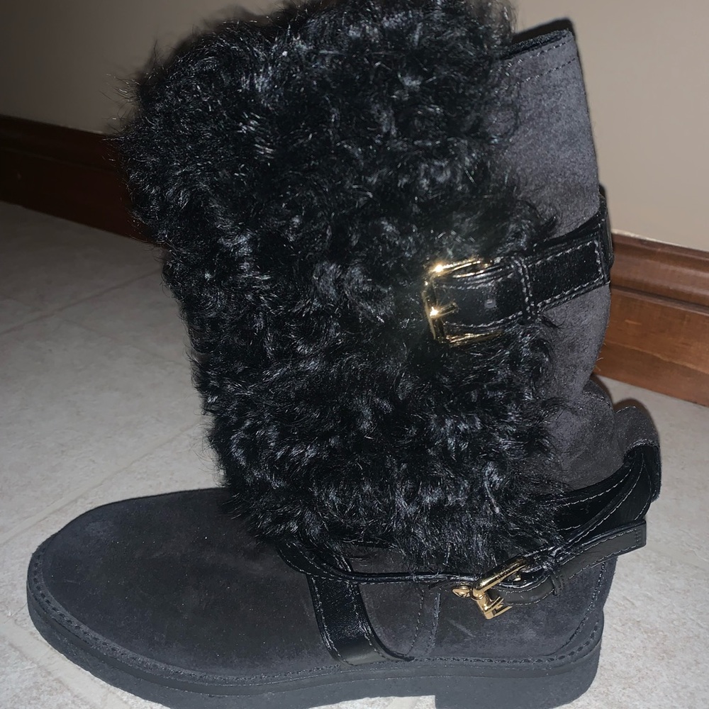 Louie Vuitton Fur boots.